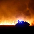 Firefighters from across Kansas and Oklahoma battle a wildfire near Protection, Kan., Monday, March 6, 2017. (Bo Rader/The Wichita Eagle via AP)