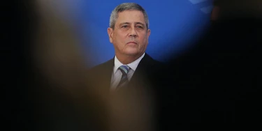 Walter Braga Netto, Brazil's incoming chief of staff, listens during a swearing-in ceremony at the Planalto Palace in Brasilia, Brazil, on Tuesday, Feb. 18, 2020. Brazil's slumping currency, the worst in the world year-to-date, was front and center of controversial remarks made by the nation's economy minister, Paulo Guedes. Photographer: Andre Coelho/Bloomberg via Getty Images