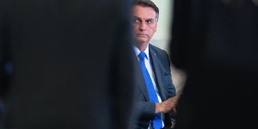 Jair Bolsonaro, Brazil's president, during the launch event of the Banco do Brasil SA Agro Investment Program at Planalto Palace in Brasilia, Brazil, on Tuesday, Aug. 24, 2021. Bolsonaro is growing uneasy about Brazils inflation in the run-up to general elections next year, but his complaints about rising prices dont mean he plans to interfere with the central bank, according to five people close to him including cabinet members. Photographer: Andressa Anholete/Bloomberg via Getty Images