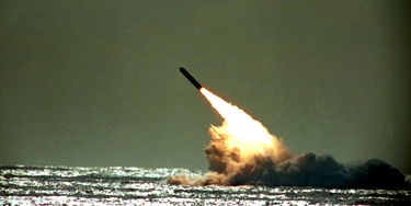 FILE - The Dec. 4, 1989 file photo shows U.S. Navy launching a Trident II, D-5 missile from the submerged submarine USS Tennessee in the Atlantic Ocean off the coast of Florida. Pushing his vision of a nuclear weapons-free world, President Barack Obama returned to Prague on Thursday, April 8, 2010 to sign a pivotal treaty aimed at sharply paring U.S. and Russian arsenals ? and repairing soured relations between the nations. With that, they will commit their nations to slash the number of strategic nuclear warheads by one-third and more than halve the number of missiles, submarines and bombers carrying them, pending ratification by their legislatures. The new treaty will shrink those warheads to 1,550 over seven years. That still allows for mutual destruction several times over. But it will send a strong signal that Russia and the U.S., which between them own more than 90 percent of the world's nuclear weapons, are serious about disarmament.  (AP Photo/Phil Sandlin, File)