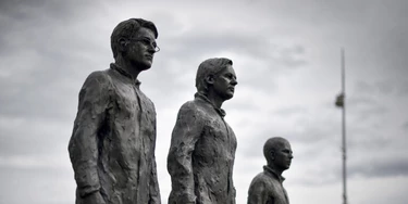 A picture of the installation "Anything to Say?", a bronze sculpture and art installation by Italian sculptor Davide Dormino representing whistleblowers (from L) Edward Snowden, Julian Assange and Chelsea Manning is seen on the Place des Nations next to the United Nations Offices in Geneva, on September 15, 2015.  AFP PHOTO / FABRICE COFFRINI

-- RESTRICTED TO EDITORIAL USE, MANDATORY MENTION OF THE ARTIST UPON PUBLICATION, TO ILLUSTRATE THE EVENT AS SPECIFIED IN THE CAPTION --        (Photo credit should read FABRICE COFFRINI/AFP/Getty Images)