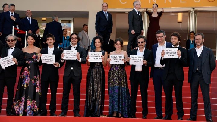 CANNES, FRANCE - MAY 17:  (2nd L-R) Actors Barbara Colen, guests, Maeve Jinkings, producer Emilie Lesclaux, director Kleber Mendonca Filho, producer Saïd Ben Saïd, actor Humberto Carrao and producer Michel Merkt attend the "Aquarius" premiere during the 69th annual Cannes Film Festival at the Palais des Festivals on May 17, 2016 in Cannes, France.  (Photo by Pascal Le Segretain/Getty Images)
