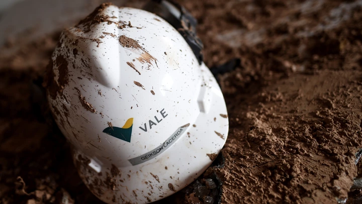 Picture of a helmet seen at an office of the mining company Vale, taken 20 days after the rupture of a tailings dam in Corrego do Feijao, near Brumadinho, in the Brazilian state of Minas Gerais, on February 13, 2019. - Communities were devastated by a collapse of a dam that killed at least 165 people after more than two weeks of searches, with 156 missing. Those listed as missing are presumed dead, but not yet located under the layers of muddy mining waste released when the tailings dam broke apart in the town of Brumadinho on January 25. (Photo by DOUGLAS MAGNO / AFP) (Photo credit should read DOUGLAS MAGNO/AFP via Getty Images)