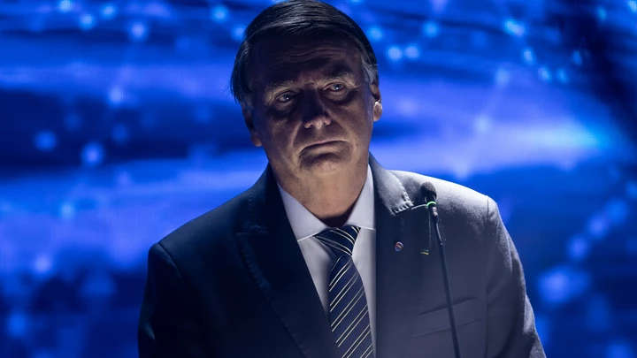 Jair Bolsonaro, Brazil's president, during the first televised presidential debate in Sao Paulo, Brazil, on Sunday, Aug. 28, 2022. Bolsonaro and former President Luiz Inacio Lula da Silva, the two front-runners in Brazils upcoming elections, had their first in-person confrontation in a televised debate five weeks before the vote. Photographer: Jonne Roriz/Bloomberg via Getty Images