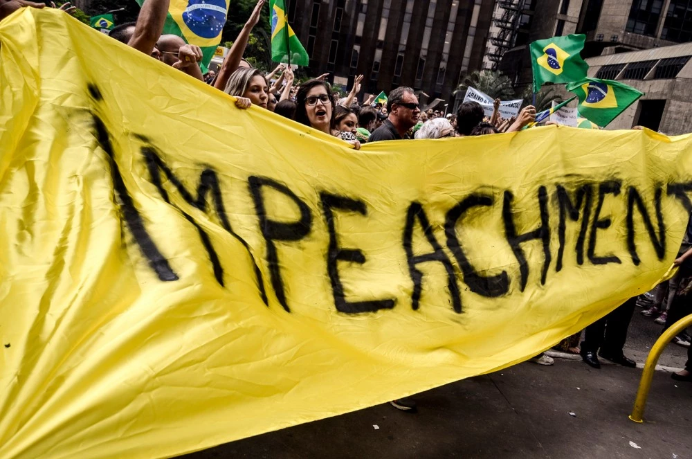 March 17th, 2016 - A few hours after the nomination of the ex-president Luiz Inacio Lula da Silva for Minister Chief of Staff, hundreds of people went to Paulista avenue, in downtown Sao Paulo, Brazil, to protest against him and president Dilma Roussef's government. Almost 24 hours later the avenue was still closed and crowded with people criticising Lula, who is investigated in the corruption scandal involving Petrobras, and his and Ms. Rousseff's party, PT (Workers' Party) (Photo by Gustavo Basso/NurPhoto) *** Please Use Credit from Credit Field ***