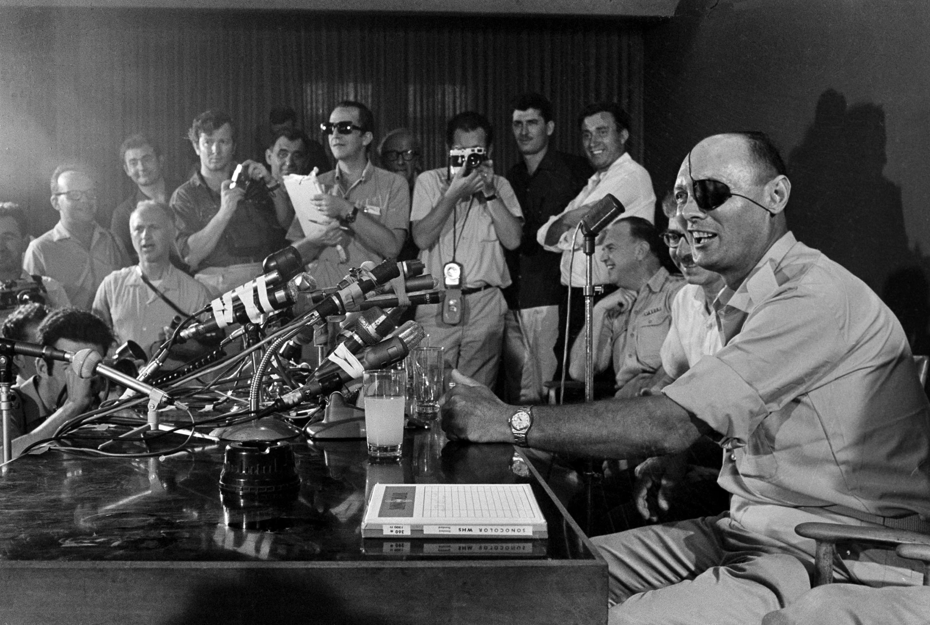 Gen. Moshe Dayan talks to newsmen in Tel Aviv as he holds his first press conference, June 3, 1967, after taking the post of Minister of Defense.  (AP Photo)