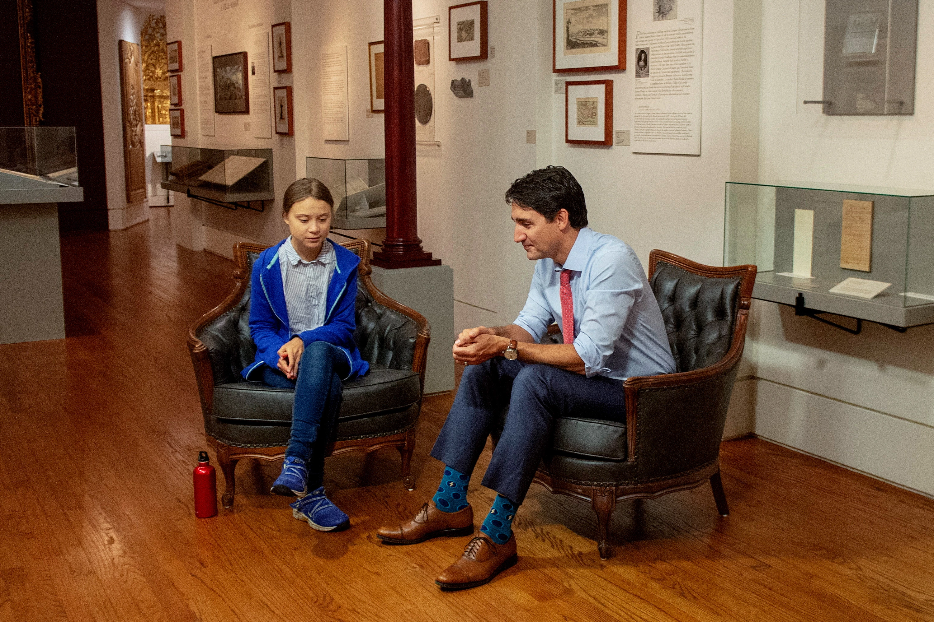 Canadian Prime Minister Justin Trudeau speaks Swedish environmental activist Greta Thunberg in Montreal on Friday, Sept. 27, 2019. (Ryan Remiorz/The Canadian Press via AP)