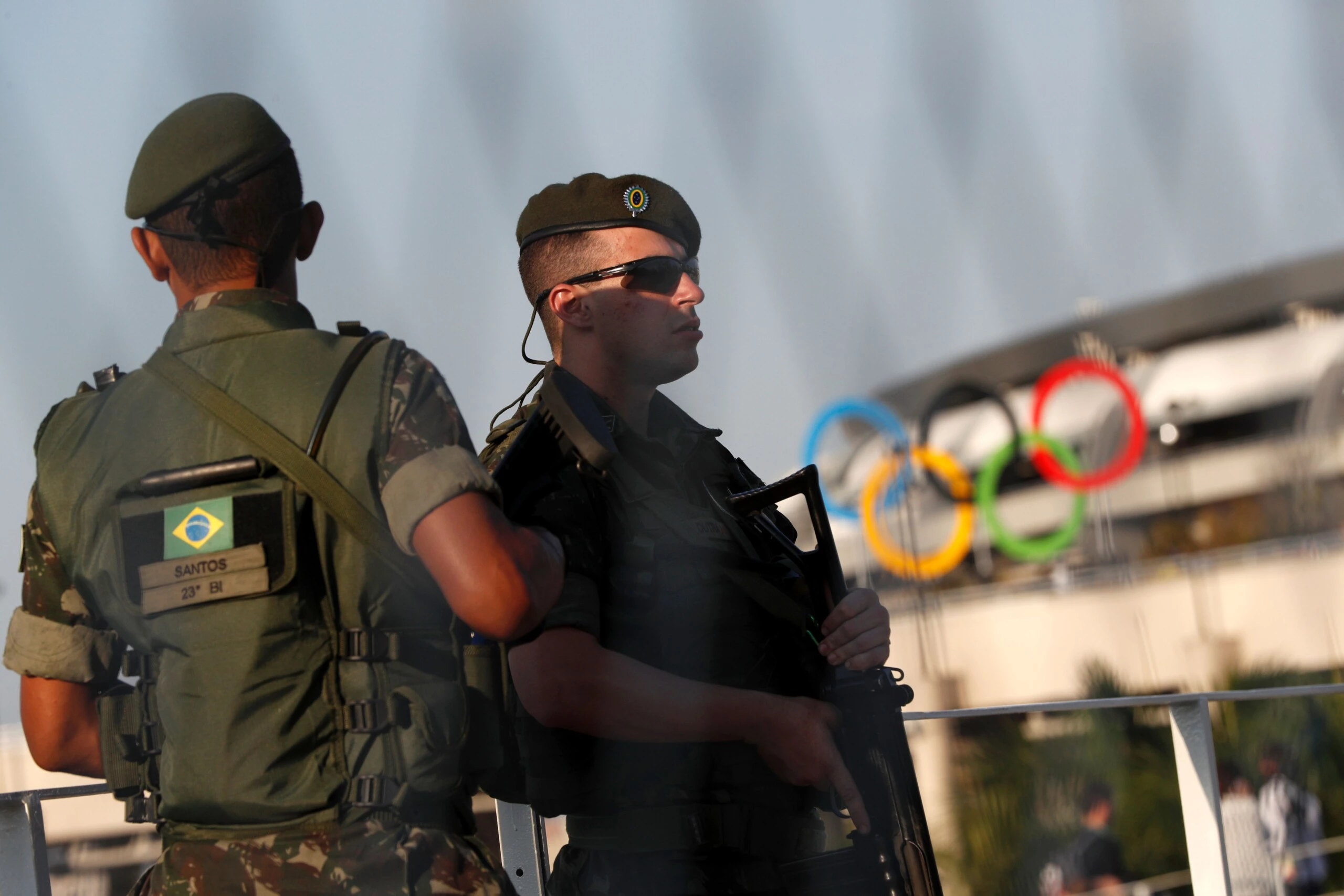 Brazilian security forces stand guard outside the Maracana stadium in Rio de Janeiro on August 5, 2016, ahead of the opening ceremony of the Rio 2016 Olympic Games. A vast security blanket of 85,000 military personnel and police -- twice the number on duty at the 2012 London Games -- are draped over the city to ward off the threat of street crime and terror attacks. / AFP / Adrian DENNIS        (Photo credit should read ADRIAN DENNIS/AFP/Getty Images)