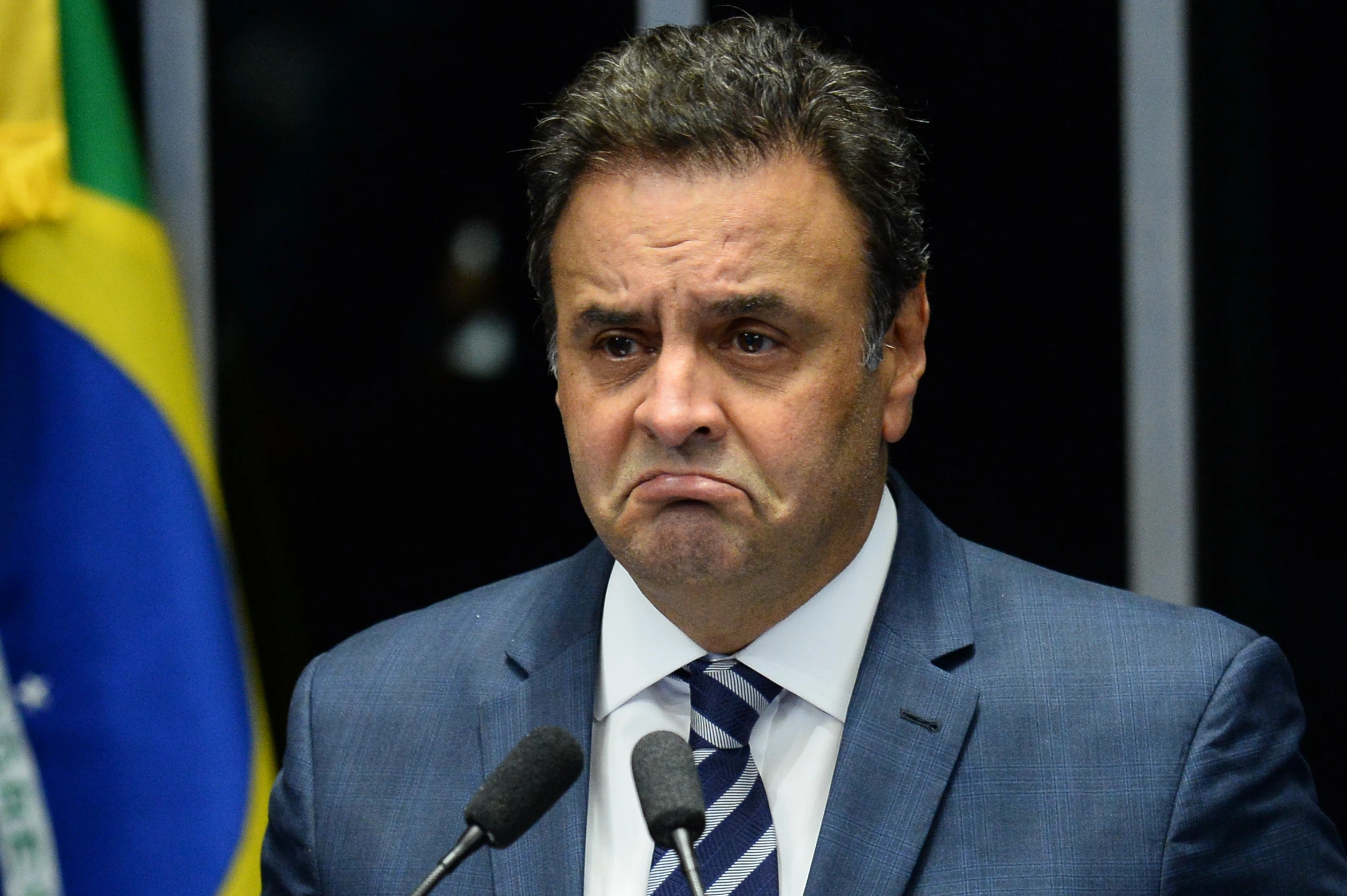 Opposition leader Senator Aecio Neves speaks during the senate impeachment trial of Brazilian suspended President Dilma Rousseff at the National Congress in Brasilia on August 30, 2016. Brazilian senators engaged in marathon debate Tuesday on the eve of voting on whether to strip Dilma Rousseff of the presidency and end 13 years of leftist rule in Latin America's biggest country. / AFP / ANDRESSA ANHOLETE        (Photo credit should read ANDRESSA ANHOLETE/AFP/Getty Images)