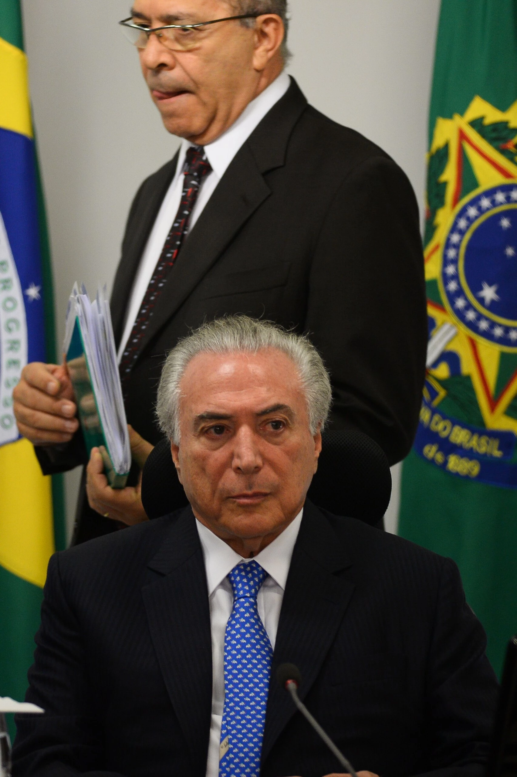 Brazilian President Michel Temer (front) and his Chief of Staff Eliseu Padilha attend a meeting with the infrastructure nucleus of the government at the Planalto Palace, in Brasilia, December 11, 2017.  / AFP / ANDRESSA ANHOLETE        (Photo credit should read ANDRESSA ANHOLETE/AFP/Getty Images)