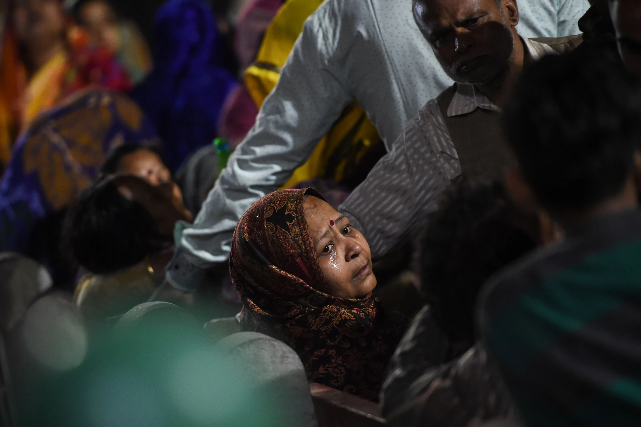 A relative of Rahul Thakur, 23, who died in this week's sectarian riots in India's capital over Prime Minister Narendra Modi's citizenship law, mourns before his cremation in New Delhi February 27, 2020. - Sporadic violence hit parts of Delhi overnight as gangs roamed streets littered with the debris of days of sectarian riots that have killed 38 people, police said on February 27. Thousands of riot police and paramilitaries patrolled the affected northeast fringes of the Indian capital of 20 million people, preventing any major eruptions however. (Photo by Money SHARMA / AFP) (Photo by MONEY SHARMA/AFP via Getty Images)