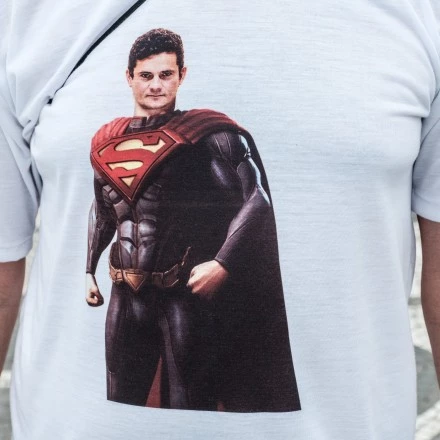 A man wears a t-shirt with the image of American comic hero Superman with the face of Brazilian Federal Judge Sergio Moro, who conducts the Lava Jato (Car wash) operation, the biggest corruption investigation in Brazil's history, during a nation-wide protest against corruption at Copacabana beach in Rio de Janeiro, Brazil, on December 4, 2016. / AFP / YASUYOSHI CHIBA        (Photo credit should read YASUYOSHI CHIBA/AFP/Getty Images)