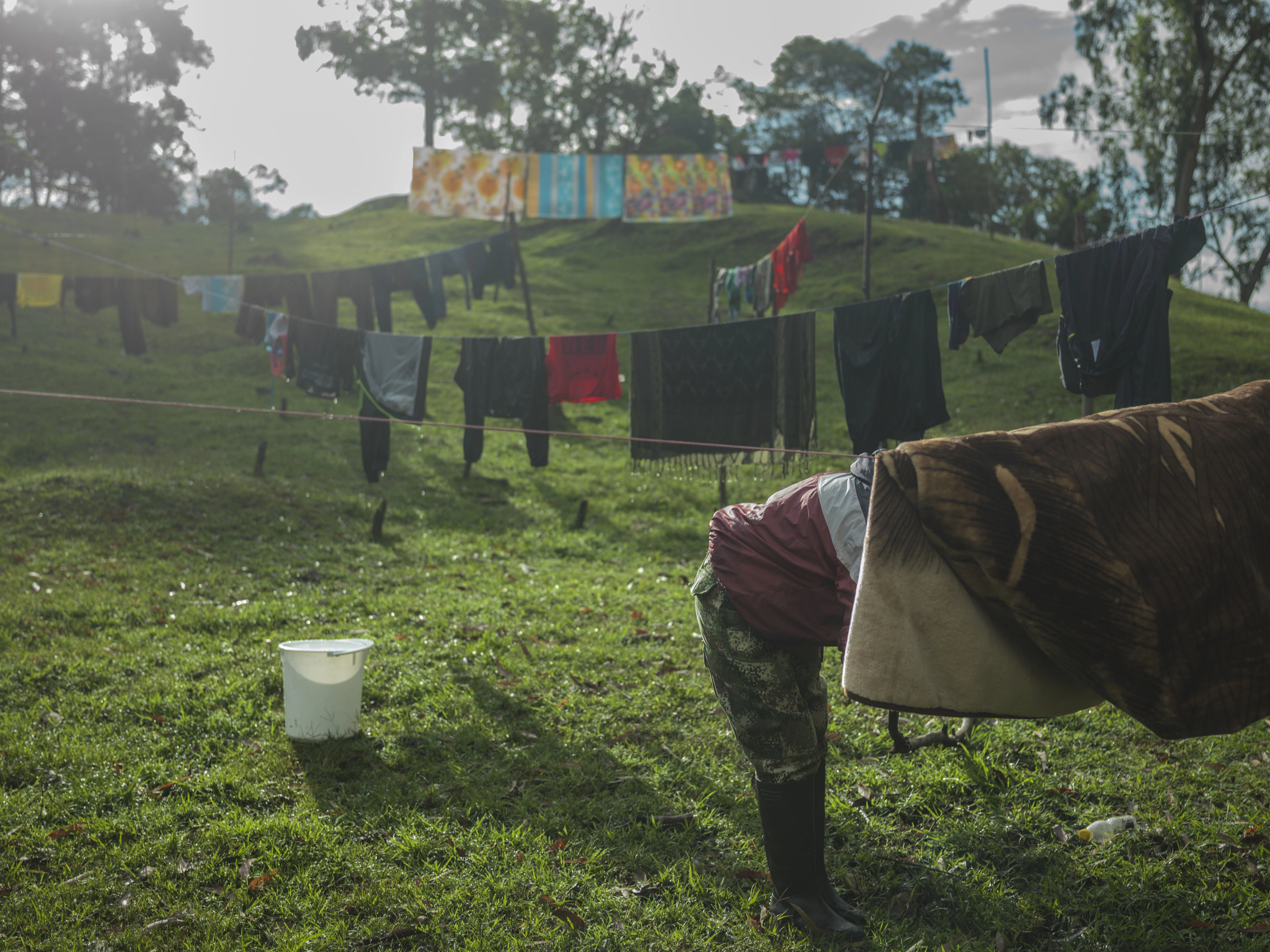 COLOMBIA. 2017. Guerrillas washing clothes and blankets.