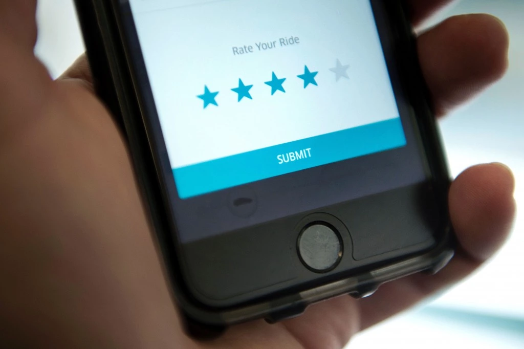 The driver rating screen in an Uber app is seen February 12, 2016 in Washington, DC.Global ridesharing service Uber said February 12, 2016 it had raised $200 million in additional funding to help its push into emerging markets.The latest round comes from Luxembourg-based investment group LetterOne (L1), according to a joint statement. / AFP / Brendan Smialowski (Photo credit should read BRENDAN SMIALOWSKI/AFP/Getty Images)