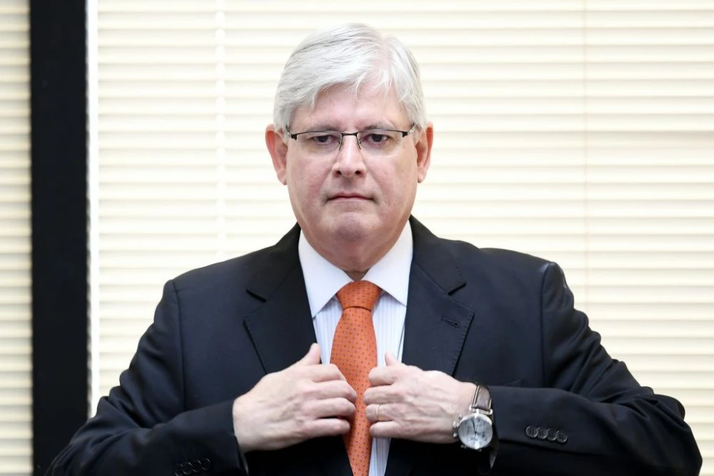 Brazil's Prosecutor General Rodrigo Janot takes part in the opening of the Brazil-Japan Seminar on Fighting Corruption, in Brasilia, on June 19, 2017. The opening of an investigation by Rodrigo Janot came close to bringing President Michel Temer down three weeks ago, but the conservative president has since dug in and defied Janot in dramatic fashion by ignoring a deadline to supply a written deposition. / AFP PHOTO / EVARISTO SA (Photo credit should read EVARISTO SA/AFP/Getty Images)