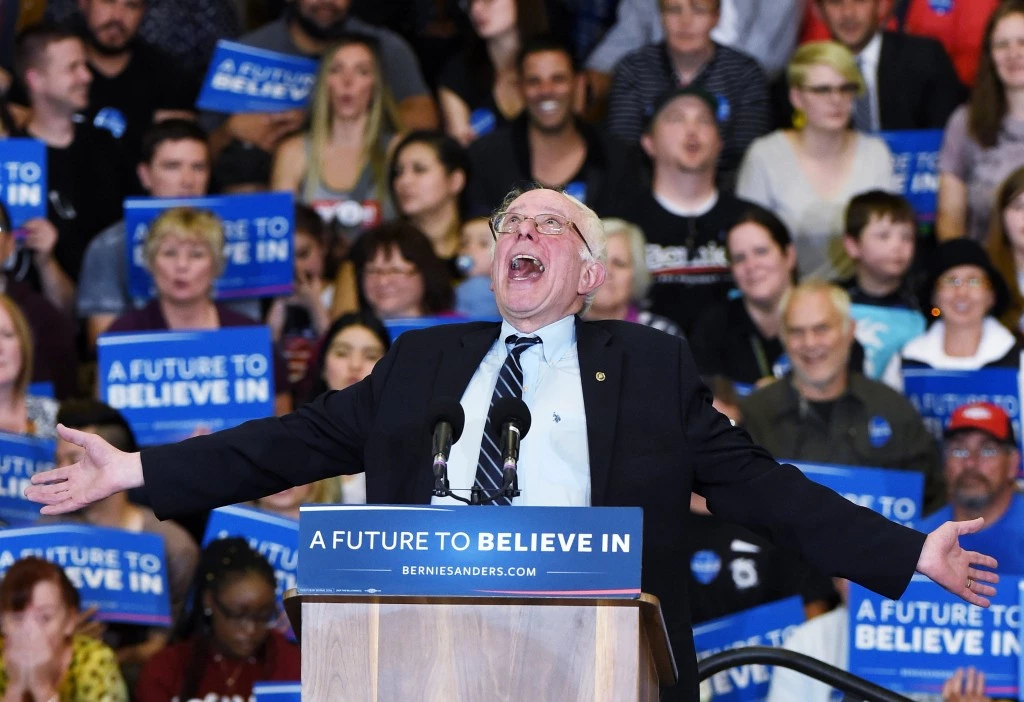 LAS VEGAS, NV - FEBRUARY 14:  Democratic presidential candidate Sen. Bernie Sanders (D-VT) jokes around as he speaks during a campaign rally at Bonanza High School on February 14, 2016 in Las Vegas, Nevada. Sanders is challenging Hillary Clinton for the Democratic presidential nomination ahead of Nevada's February 20th Democratic caucus.  (Photo by Ethan Miller/Getty Images)