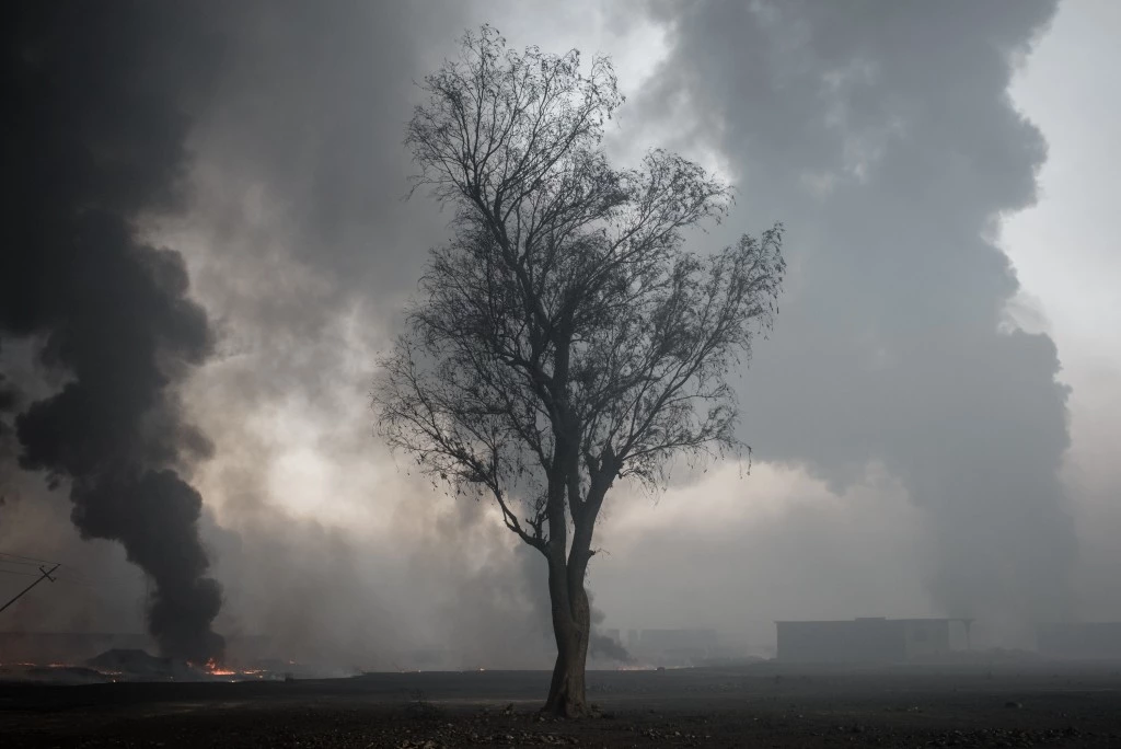 Burning oil pits in Qayyarah, Iraq on Oct. 26, 2016.