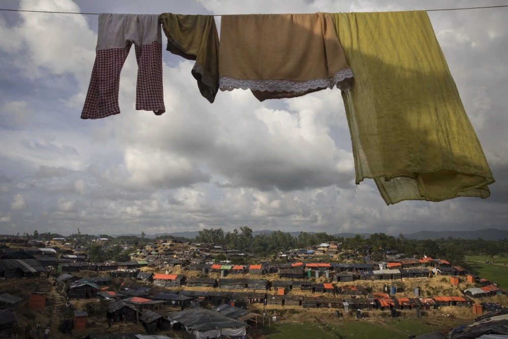 BALUKHALI, BANGLADESH - OCTOBER 2: Laundry is seen hanging overlooking the sprawling refugee camp on October 2, 2017 in Balukhali, Cox's Bazar, Bangladesh. Over a half a million Rohingya refugees have fled into Bangladesh since late August during the outbreak of violence in Rakhine state causing a humanitarian crisis in the region with continued challenges for aid agencies. (Photo by Paula Bronstein/Getty Images)