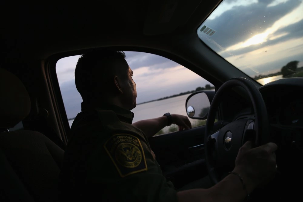 WESLACO, TX - APRIL 13:  A Border Patrol agent looks for illegal immigrants near the U.S.-Mexico border on April 13, 2016 in Weslaco, Texas. Border security and immigration, both legal and otherwise, continue to be contentious national issues in the 2016 Presidential campaign.  (Photo by John Moore/Getty Images)