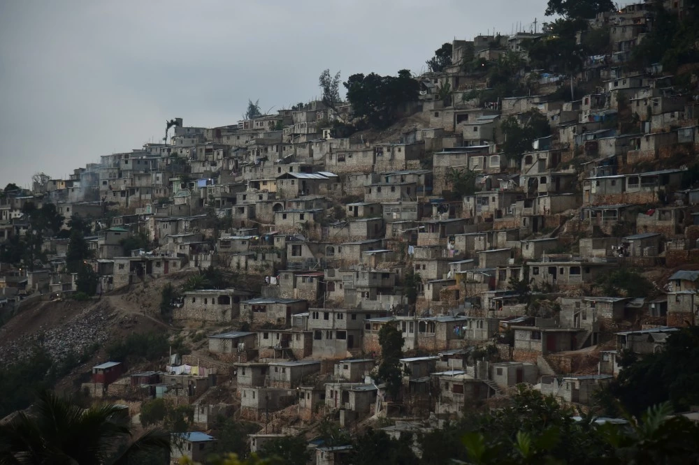 View of houses on a mountain in Juvenat, in the commune of Petion-Ville, in Port-au-Prince, on December 12, 2017. / AFP PHOTO / HECTOR RETAMAL        (Photo credit should read HECTOR RETAMAL/AFP/Getty Images)
