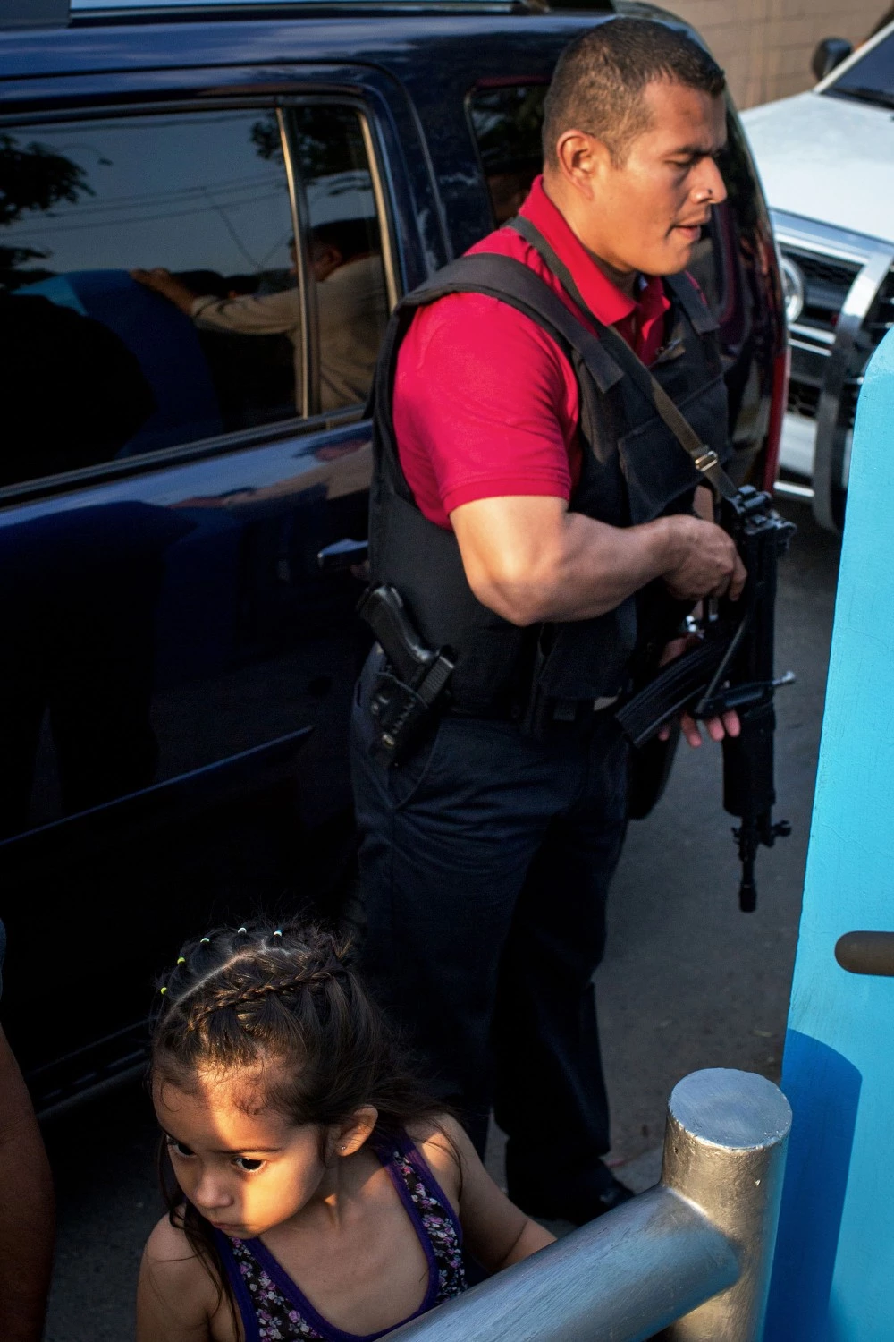 April 2017, El Salvador, San Salvador. The Mayor of San Salvador's security guard in Colonia Iberia. (Natalie Keyssar)