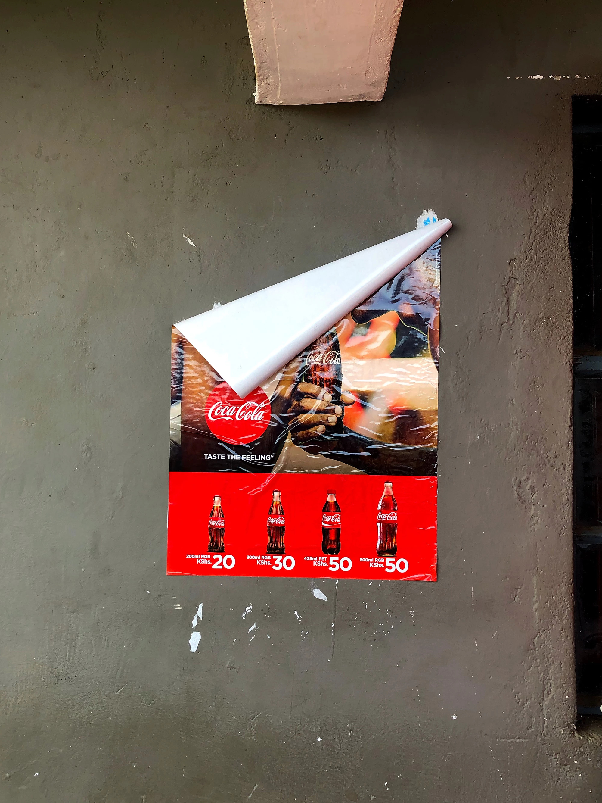 A Coca-Cola ad on the wall of a restaurant in Northern Kenya.