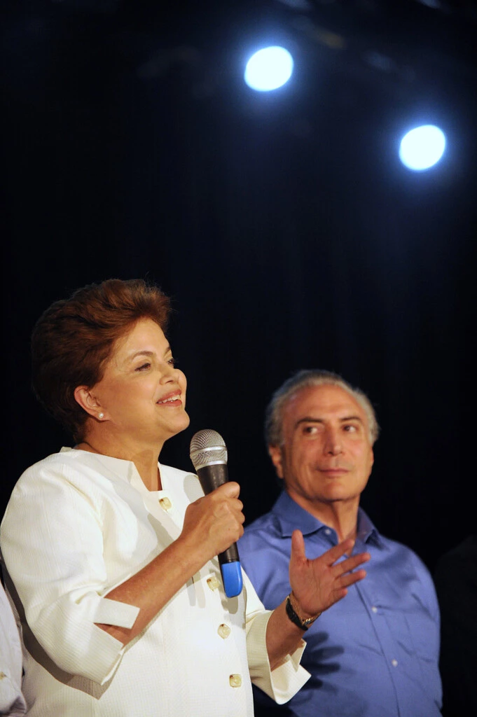 Brazilian presidential candidate for the ruling Workers' Party (PT), Dilma Rousseff and her running mate Michel Temer from the Brazilian Democratic Movement Party (PMDB) speak after receiving the results of the country's general elections, in Brasilia, October 3, 2010. Brazil's presidential election is to go to an October 31 runoff after the ruling party candidate, Dilma Rousseff, won elections on October 3 but not by enough to avoid a second round, the High Electoral Tribunal said.  AFP PHOTO/EVARISTO SA (Photo credit should read EVARISTO SA/AFP/Getty Images)