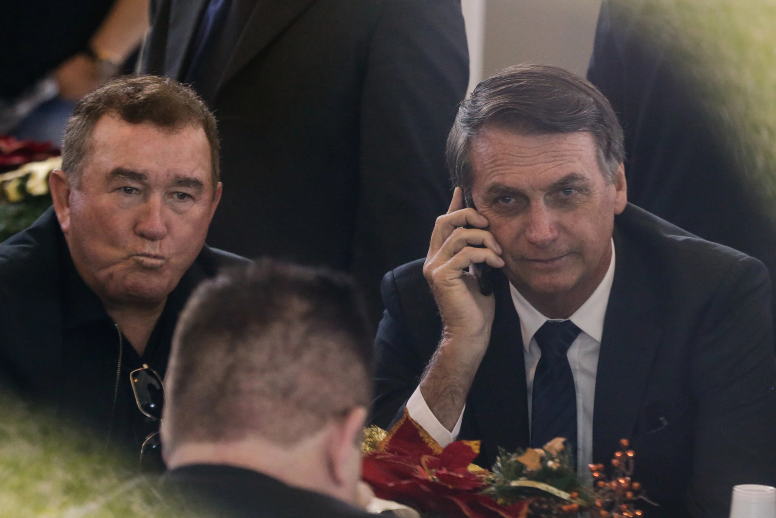 Recém eleito presidente, Jair Bolsonaro almoça com Amado Batista no dia 11 de dezembro de 2018.