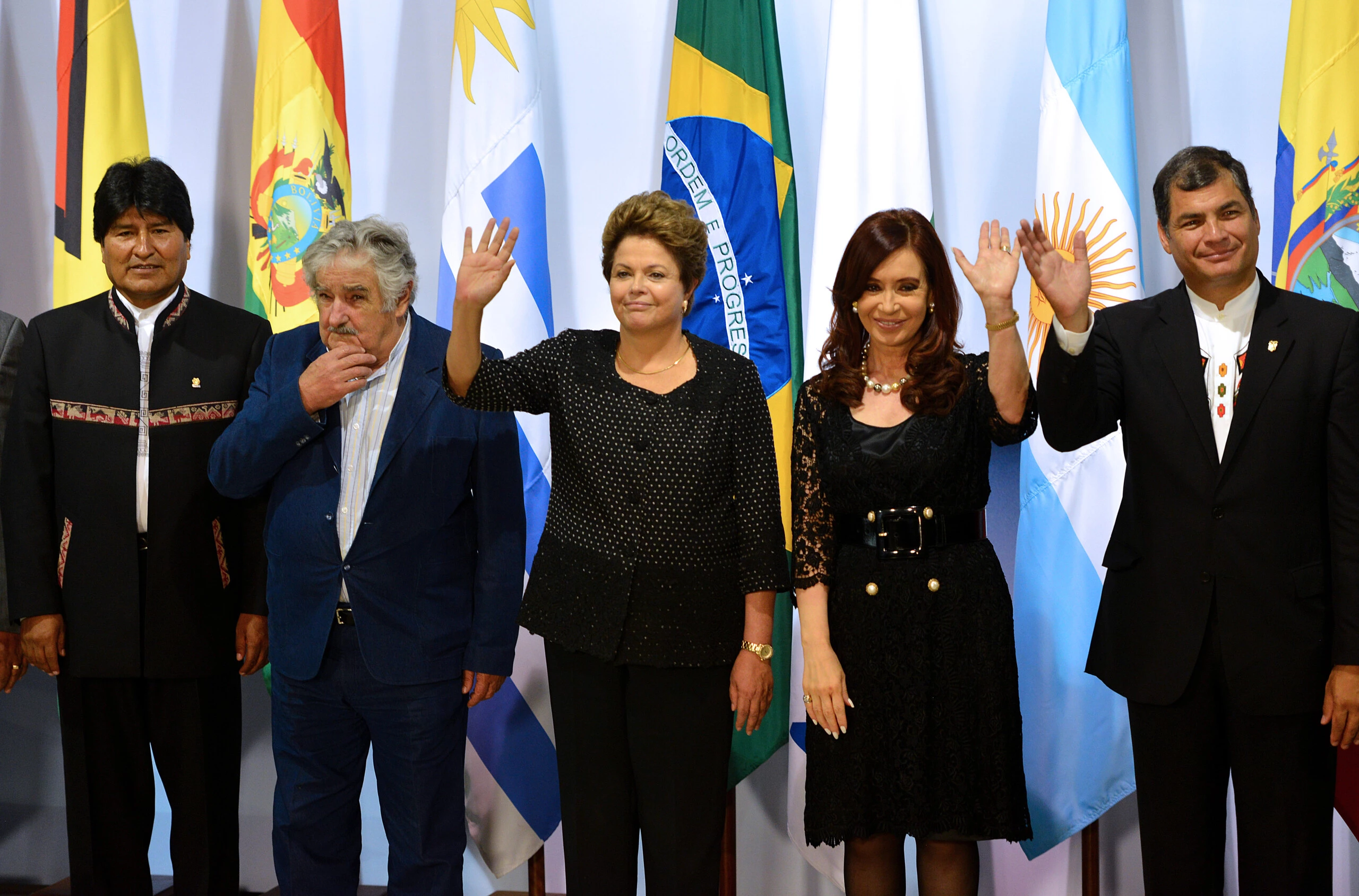 (L to R) Presidents from Bolivia, Evo Morales, Uruguay, Jose Mujica, Brazil, Dilma Rousseff, Argentinian Cristina Fernandez de Kirchner and Ecuador, Rafael Correa, pose for the official picture of the Summit of Heads of State of Mercosur and Associated States, at Itamaraty Palace, Bras?lia on December 7, 2012. AFP PHOTO/Pedro LADEIRA        (Photo credit should read PEDRO LADEIRA/AFP/Getty Images)