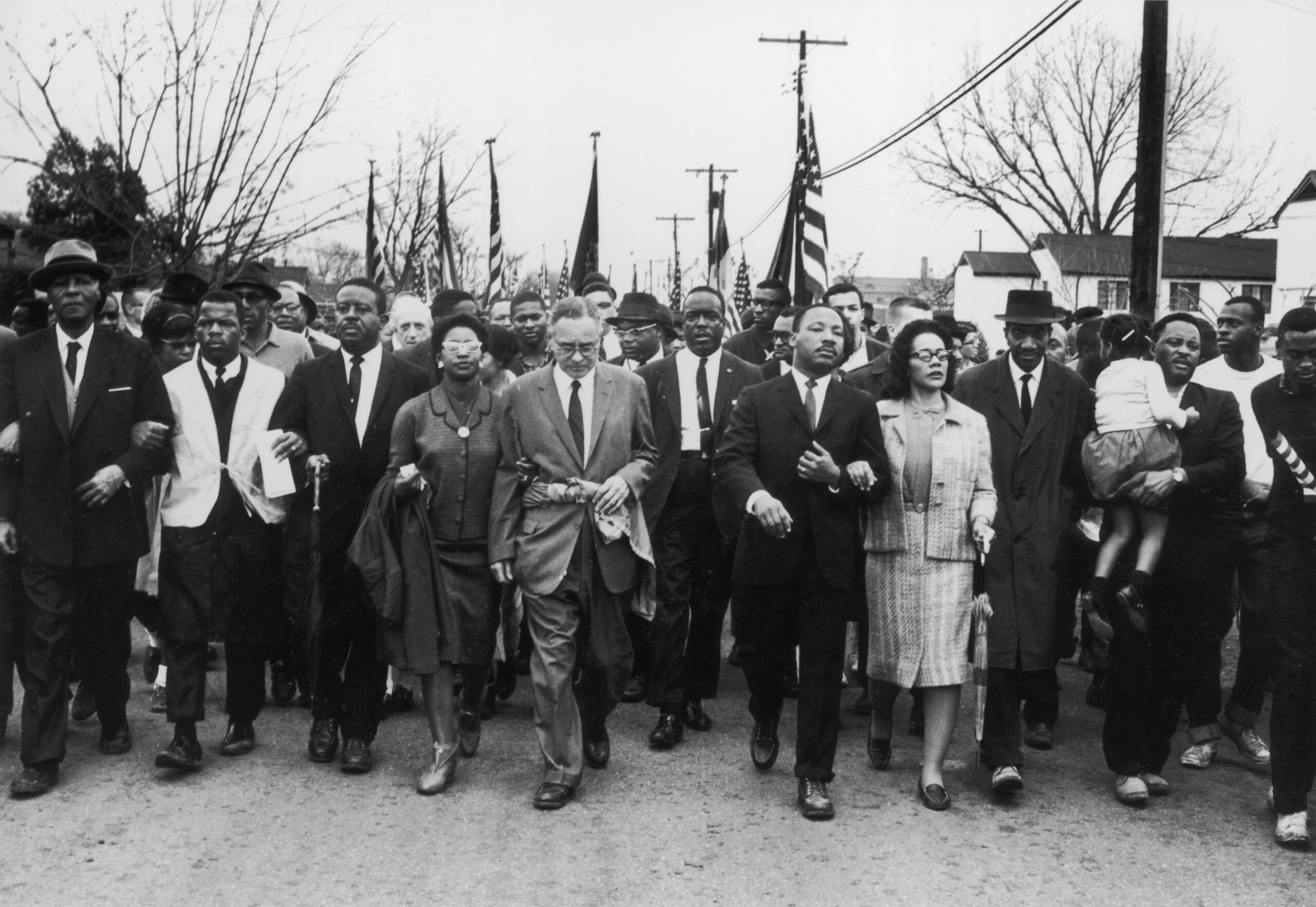 30th March 1965:  American civil rights campaigner Martin Luther King (1929  - 1968) and his wife Coretta Scott King lead a black voting rights march from Selma, Alabama, to the state capital in Montgomery.  (Photo by William Lovelace/Express/Getty Images)