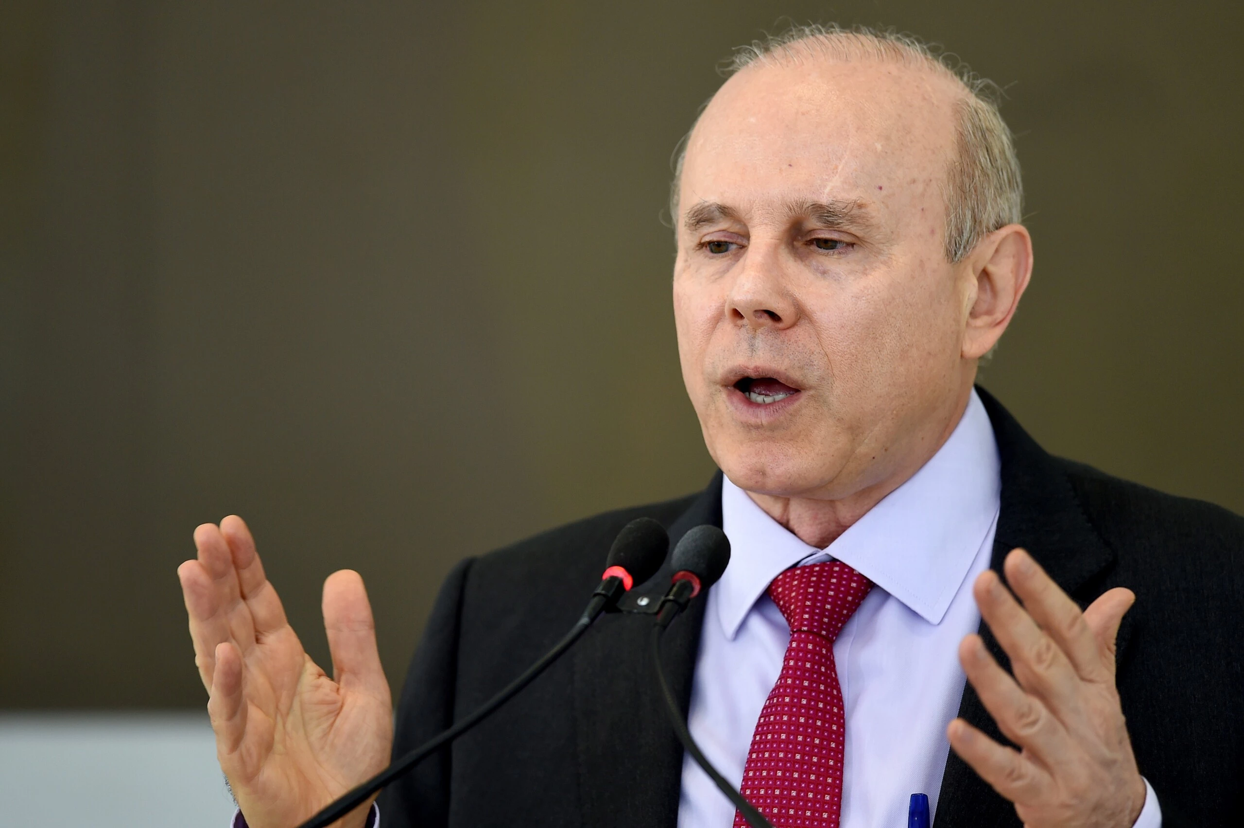 Brazilian Finance Minister Guido Mantega speaks during a meeting  of the Council of Economic and Social Development at the Palacio do Planalto in Brasilia on June 5, 2014. At one week of the start of the FIFA World Cup Brazil 2104, the government faces threats of strikes in various sectors like transportation, public safety and education, besides protests in all the host cities of the World Cup. AFP PHOTO/Evaristo SA        (Photo credit should read EVARISTO SA/AFP/Getty Images)