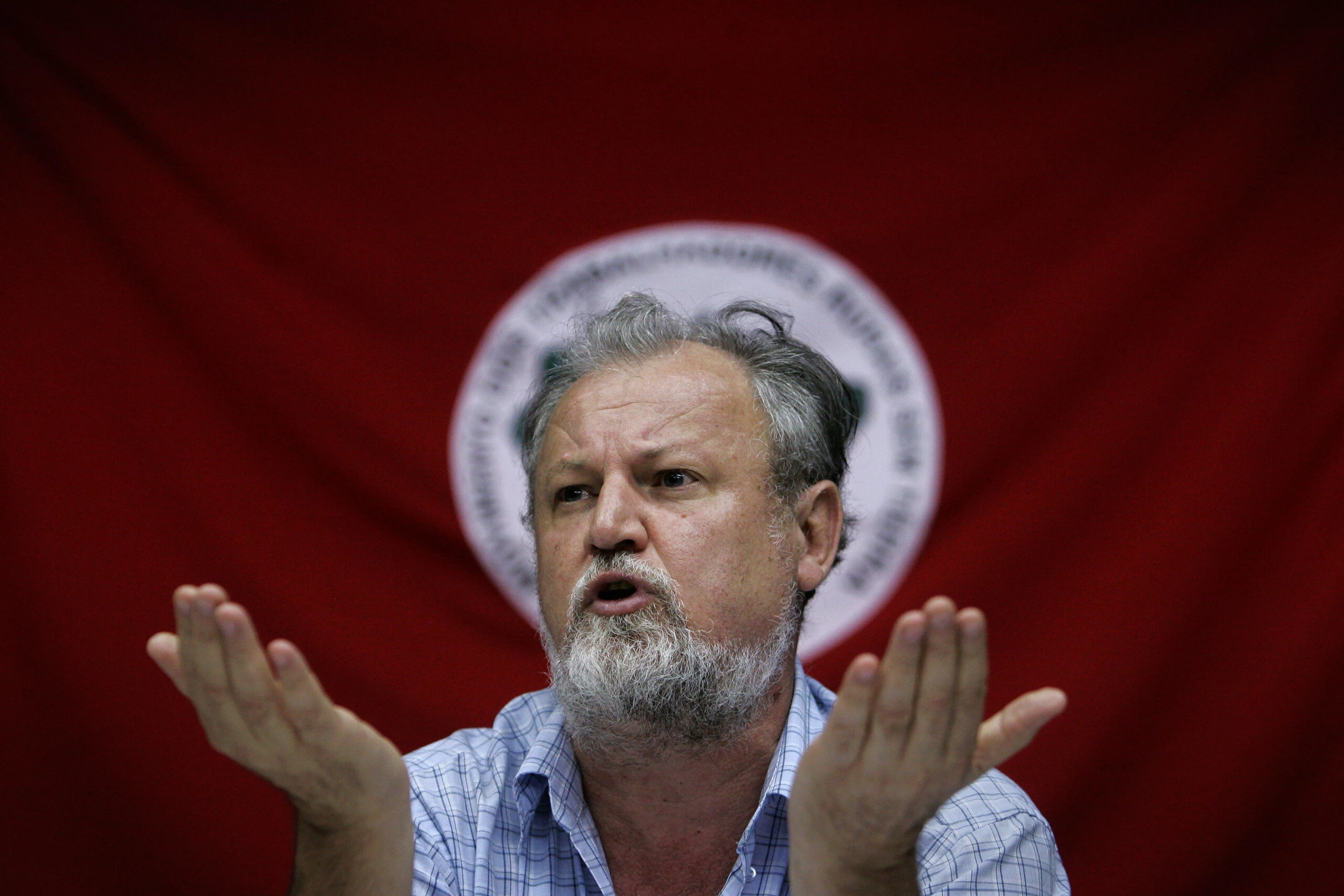 Brazil's Landless Workers Movement (MST) leader Joao Pedro Stedile answers questions during a press conference with foreign journalists, in Sao Paulo, Brazil, on April 14, 2009.  AFP PHOTO/Mauricio LIMA (Photo credit should read MAURICIO LIMA/AFP/Getty Images)