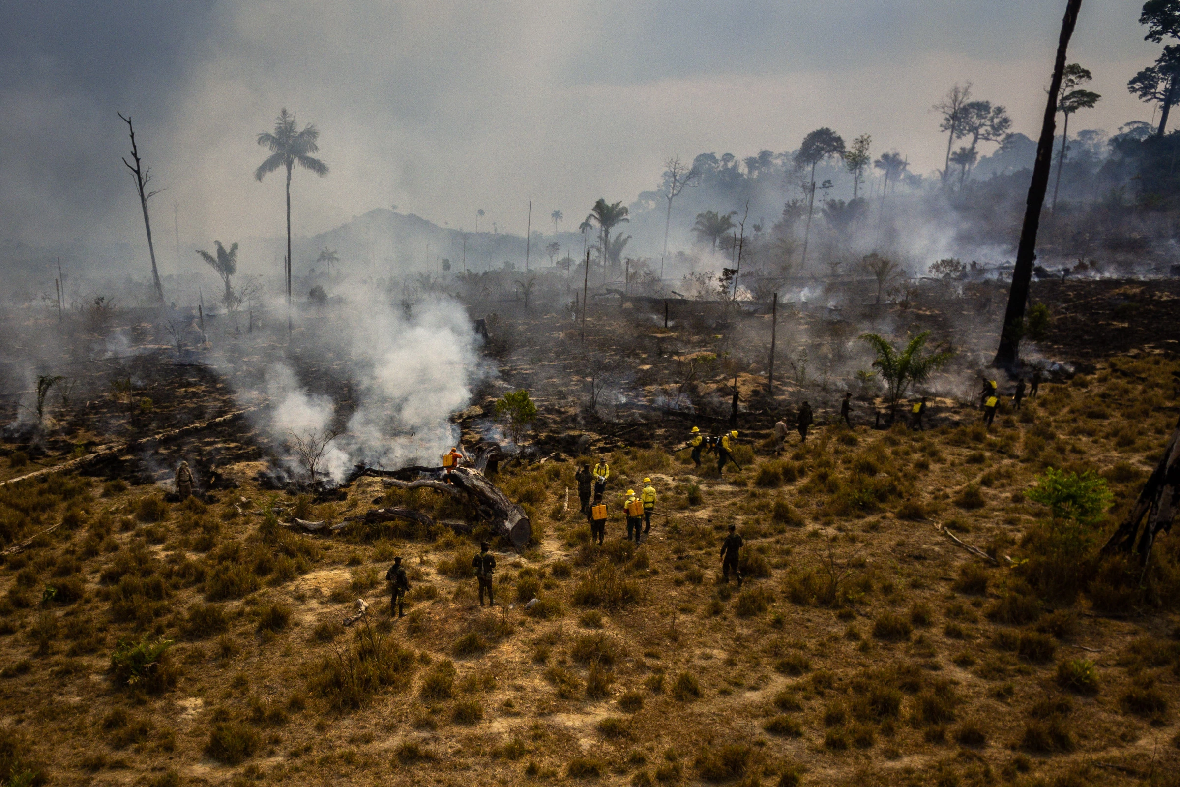 PARA, BRAZIL, 03/09/2019 -  Members of the IBAMA forest fire brigade (named Prevfogo) fight burning in the Amazon area of rural settlement PDS Nova Fronteira, in the city of Novo Progresso, Para state, northern Brazil, this Tuesday, September 3rd. Since the end of August Prevfogo has been acting with the assistance of Brazilian Army military. Bolsonaro government budget cuts since January 2019 have severely affected brigades, which have been reduced in critical regions such as the Amazon. (Photo by Gustavo Basso/NurPhoto via Getty Images)