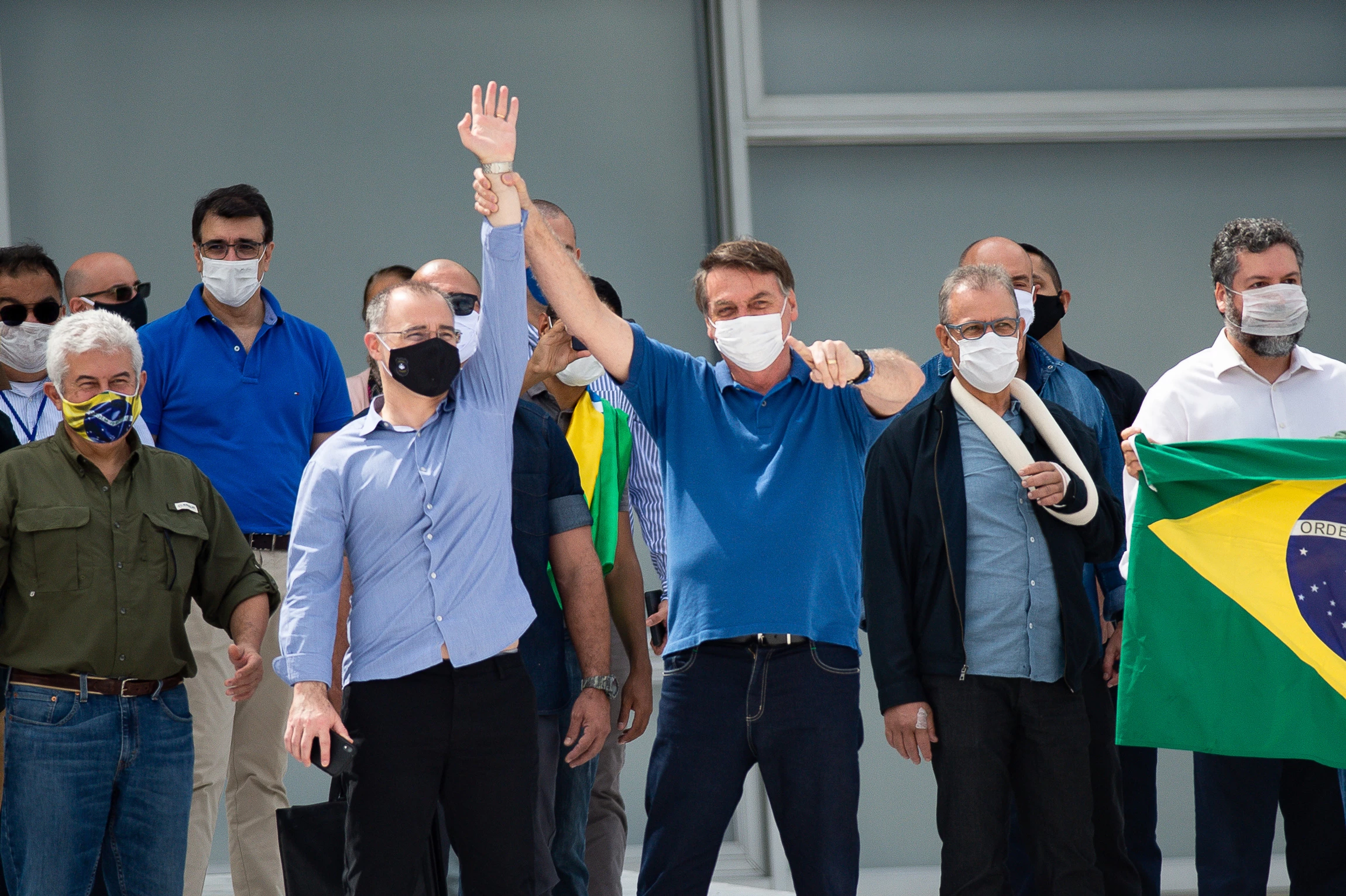 Brazilian President Jair Bolsonaro and Justice Minister André Luiz Mendonça participates in a protest against the National Congress and the Supreme Court amidst the coronavirus (COVID-19) pandemic at the Planalto Palace on May 17, 2020 in Brasilia.