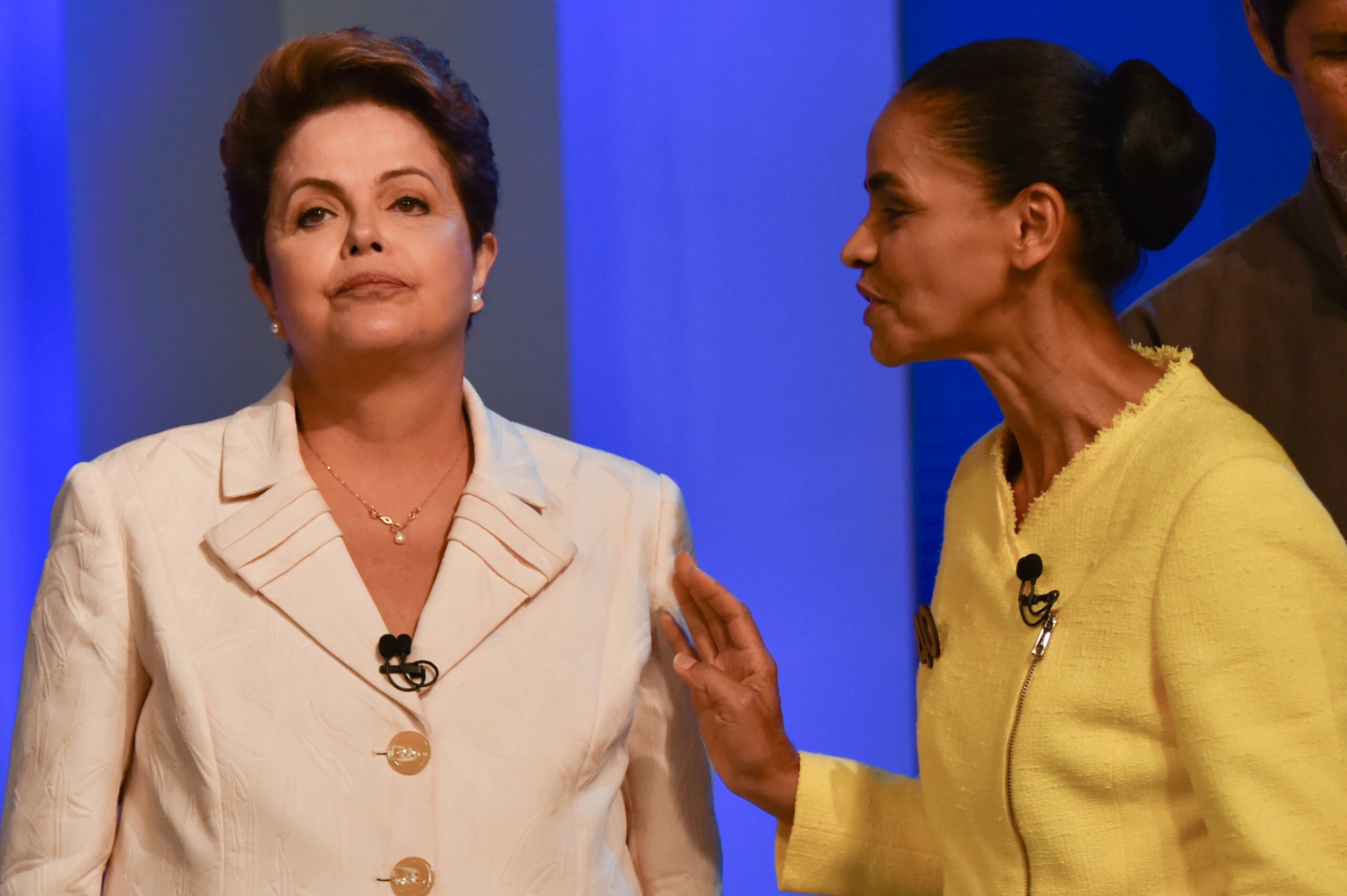 Brazilian President and candidate of Brazilian presidential election for the Workers Party (PT) Dilma Rousseff (L) and Marina Silva, a candidate for the Brazilian Socialist Party (PSB), attend their last TV debate in Rio de Janeiro, Brazil, on October 2, 2014. The general election will be held on October 5, 2014.  AFP PHOTO / YASUYOSHI CHIBA        (Photo credit should read YASUYOSHI CHIBA/AFP/Getty Images)