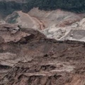 General view of the rebuilding site next to the collapsed iron ore waste dam of Brazilian mining company Samarco, in Mariana, Minas Gerais State, Brazil, on October 26, 2016.Next November 5 marks the first anniversary of the burst of the iron ore waste dam of Samarco -owned by BHP Billiton and Vale SA- which killed nineteen people and destroyed the ecosystem of the Doce River in the worst mining accident in Brazil's history. / AFP / YASUYOSHI CHIBA (Photo credit should read YASUYOSHI CHIBA/AFP/Getty Images)