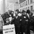 NEW YORK, UNITED STATES:  Civil rights leader Rev. Martin Luther King, Jr., (C) is accompanied by famed pediatrician Dr. Benjamin Spock (2nd-L), Father Frederick Reed (3rd-R) and union leader Cleveland Robinson (2nd-R) 16 March, 1967, during an anti-Vietnam War demonstration in New York. The US is celebrating in 2004 what would have been King's 75th birthday. King was assassinated on 04 April, 1968, in Memphis, Tennessee. AFP PHOTO (Photo credit should read AFP/AFP/Getty Images)