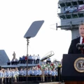 USS ABRAHAM LINCOLN, AT SEA: (FILES) -- A file photo taken 01 May 2003 shows US President George W. Bush addressing the nation aboard the nuclear aircraft carrier USS Abraham Lincoln as it sails for Naval Air Station North Island, San Diego, California. Four years after the US-led invasion of Iraq, commanders are in fact pouring 25,000 reinforcements into Baghdad to quell Sunni-Shiite fighting, the bloodiest element of the conflict and one which even the Pentagon admits now amounts to civil war.        AFP Photo / Stephen JAFFE (Photo credit should read STEPHEN JAFFE/AFP/Getty Images)