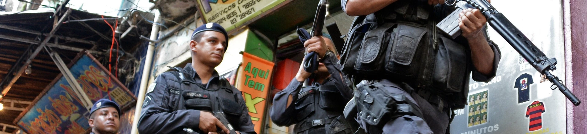 Brazilian BOPE police elite unit personnel patrol during an operation at Rocinha shantytown in Rio de Janeiro, Brazil on April 12, 2013.  AFP PHOTO/VANDERLEI ALMEIDA        (Photo credit should read VANDERLEI ALMEIDA/AFP/Getty Images) Brazilian BOPE police elite unit personnel patrol during an operation at Rocinha shantytown in Rio de Janeiro, Brazil on April 12, 2013.  AFP PHOTO/VANDERLEI ALMEIDA        (Photo credit should read VANDERLEI ALMEIDA/AFP/Getty Images)