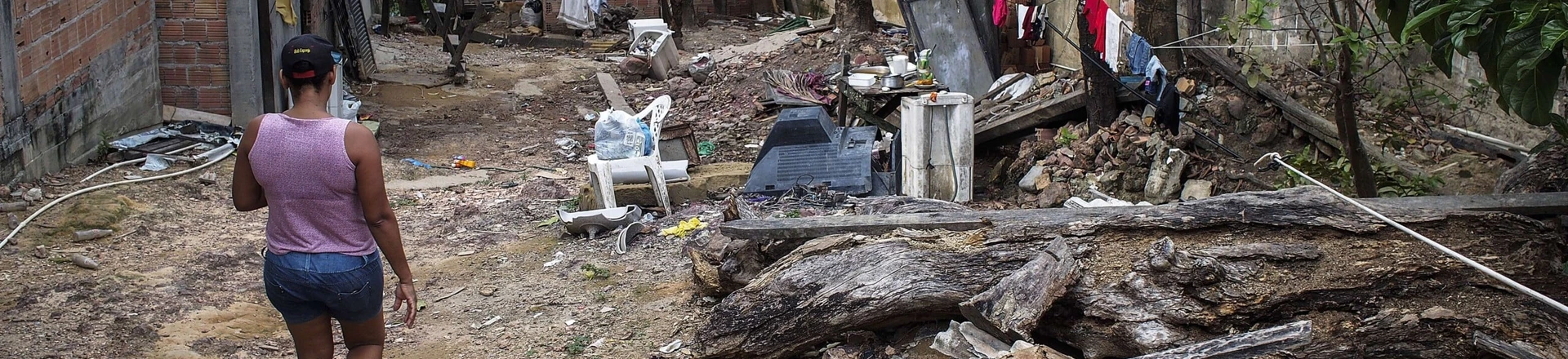 A woman walks down a pathway in the Comunidade Negra do Barranco Sao Banadito village in Manaus, Brazil on October 20th, 2014. The Comunidade Negra do Barranco Sao Benedito, a village comprising 25 families, has been defined as the second urban "quilombo" (a settlement inhabited by escaped slaves) to be recognized in Brazil. AFP PHOTO/ Raphael Alves (Photo credit should read RAPHAEL ALVES/AFP/Getty Images) A woman walks down a pathway in the Comunidade Negra do Barranco Sao Banadito village in Manaus, Brazil on October 20th, 2014. The Comunidade Negra do Barranco Sao Benedito, a village comprising 25 families, has been defined as the second urban "quilombo" (a settlement inhabited by escaped slaves) to be recognized in Brazil. AFP PHOTO/ Raphael Alves (Photo credit should read RAPHAEL ALVES/AFP/Getty Images)