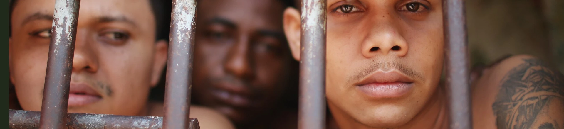 SAO LUIS, BRAZIL - JANUARY 27:  Inmates stand in their cell in the Pedrinhas Prison Complex, the largest penitentiary in Maranhao state, on January 27, 2015 in Sao Luis, Brazil. Previously one of the most violent prisons in Brazil, Pedrinhas has seen efforts from a new state administration, new prison officials and judiciary leaders from Maranhao which appear to have quelled some of the unrest within the complex. In 2013, nearly 60 inmates were killed within the complex, including three who were beheaded during rioting. Much of the violence stemmed from broken cells allowing inmates and gang rivals to mix in the patios and open spaces of the complex. Officials recently repaired and repopulated the cells allowing law enforcement access and decreasing violence among prisoners, according to officials. Other reforms include a policy of custody hearings and real-time camera feeds. According to officials there have been no prisoner on prisoner killings inside the complex in nearly four months. Critics believe overcrowding is one of the primary causes of rioting and violence in Brazil's prisons. Additionally, overcrowding has strengthened prison gangs which now span the country and contol certain peripheries of cities including Rio de Janeiro, Sao Paulo and Sao Luis. Brazil now has the fourth-largest prison population in the world behind the U.S., Russia and China. The population of those imprisoned had quadrupled in the past twenty years to around 550,000 and the country needs at least 200,000 new incarceration spaces to eliminate overcrowding. A vast increase in minor drug arrests, a dearth of legal advice for prisoners and a lack of political will for new prisons have contributed to the increases.  (Photo by Mario Tama/Getty Images) SAO LUIS, BRAZIL - JANUARY 27:  Inmates stand in their cell in the Pedrinhas Prison Complex, the largest penitentiary in Maranhao state, on January 27, 2015 in Sao Luis, Brazil. Previously one of the most violent prisons in Brazil, Pedrinhas has seen efforts from a new state administration, new prison officials and judiciary leaders from Maranhao which appear to have quelled some of the unrest within the complex. In 2013, nearly 60 inmates were killed within the complex, including three who were beheaded during rioting. Much of the violence stemmed from broken cells allowing inmates and gang rivals to mix in the patios and open spaces of the complex. Officials recently repaired and repopulated the cells allowing law enforcement access and decreasing violence among prisoners, according to officials. Other reforms include a policy of custody hearings and real-time camera feeds. According to officials there have been no prisoner on prisoner killings inside the complex in nearly four months. Critics believe overcrowding is one of the primary causes of rioting and violence in Brazil's prisons. Additionally, overcrowding has strengthened prison gangs which now span the country and contol certain peripheries of cities including Rio de Janeiro, Sao Paulo and Sao Luis. Brazil now has the fourth-largest prison population in the world behind the U.S., Russia and China. The population of those imprisoned had quadrupled in the past twenty years to around 550,000 and the country needs at least 200,000 new incarceration spaces to eliminate overcrowding. A vast increase in minor drug arrests, a dearth of legal advice for prisoners and a lack of political will for new prisons have contributed to the increases.  (Photo by Mario Tama/Getty Images)