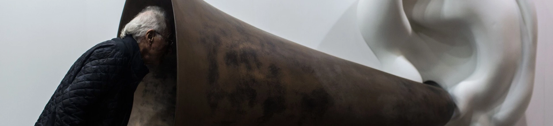 A visitor peers into US artist John Baldessari's "Beethoven's Trumpet (With Ear) Opus # 133" at the Art Basel fair in Hong Kong on March 15, 2015. Hong Kong's biggest art fair, Art Basel, opened its doors with thousands of visitors expected for a city-wide canvas of creativity and commerce. AFP PHOTO / ANTHONY WALLACEMANDATORY MENTION OF THE ARTIST, TO ILLUSTRATE THE EVENT AS SPECIFIED IN THE CAPTION (Photo credit should read ANTHONY WALLACE/AFP/Getty Images) A visitor peers into US artist John Baldessari's "Beethoven's Trumpet (With Ear) Opus # 133" at the Art Basel fair in Hong Kong on March 15, 2015. Hong Kong's biggest art fair, Art Basel, opened its doors with thousands of visitors expected for a city-wide canvas of creativity and commerce. AFP PHOTO / ANTHONY WALLACEMANDATORY MENTION OF THE ARTIST, TO ILLUSTRATE THE EVENT AS SPECIFIED IN THE CAPTION (Photo credit should read ANTHONY WALLACE/AFP/Getty Images)