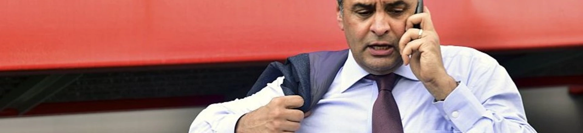 Brazilian senator Aecio Neves speaks on his mobile phone upon arrival at the Maiquetia international airport in Caracas on June 18, 2015. Brazilian senators arrived in Venezuela to look up the situation of imprisoned dissidents on hunger strike, but failed to do so and flew back to Brazil. AFP PHOTO/CARLOS BECERRA (Photo credit should read CARLOS BECERRA/AFP/Getty Images) Brazilian senator Aecio Neves speaks on his mobile phone upon arrival at the Maiquetia international airport in Caracas on June 18, 2015. Brazilian senators arrived in Venezuela to look up the situation of imprisoned dissidents on hunger strike, but failed to do so and flew back to Brazil. AFP PHOTO/CARLOS BECERRA (Photo credit should read CARLOS BECERRA/AFP/Getty Images)