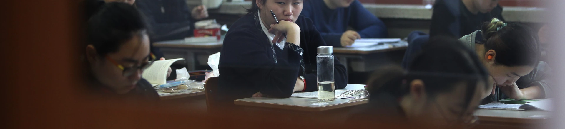 SEOUL, SOUTH KOREA - NOVEMBER 12: South Korean students take their College Scholastic Ability Test at a school on November 12, 2014 in Seoul, South Korea. More than 630,000 high school seniors and graduates sit for the examinations at 1,212 test centers across the country, where academic records are all important. Success in the exam, one of the most rigourous standardized tests in the world, enables students to study at Korea's top universities. (Photo by Chung Sung-Jun/Getty Images) SEOUL, SOUTH KOREA - NOVEMBER 12: South Korean students take their College Scholastic Ability Test at a school on November 12, 2014 in Seoul, South Korea. More than 630,000 high school seniors and graduates sit for the examinations at 1,212 test centers across the country, where academic records are all important. Success in the exam, one of the most rigourous standardized tests in the world, enables students to study at Korea's top universities. (Photo by Chung Sung-Jun/Getty Images)