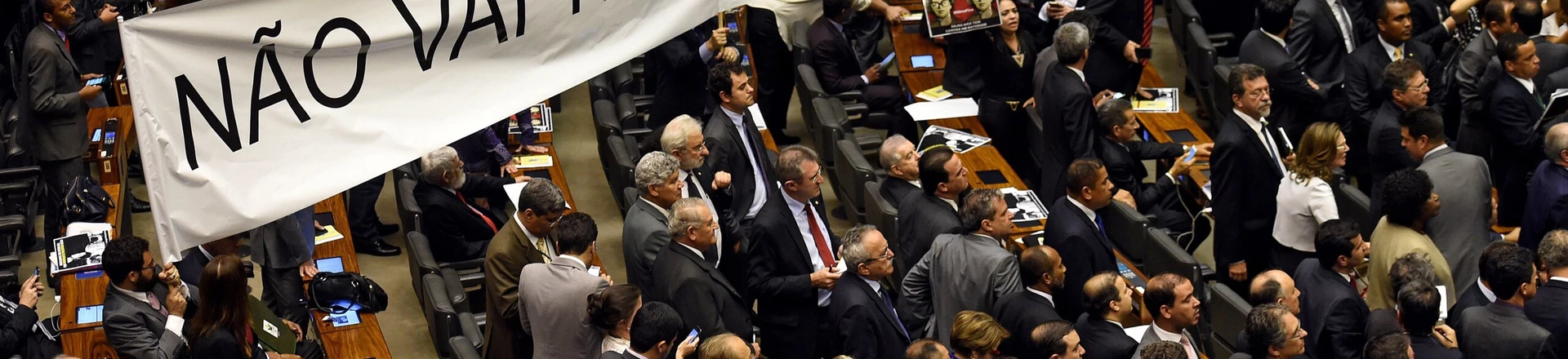 Brazilian pro-government deputies hold a banner reading "There will not be a coup" during the election of members for a special congressional commission that will be first up to analyze the impeachment case against President Dilma Rousseff, at the National Congress in Brasilia, on December 8, 2015. Pro-impeachment deputies got 39 out of 65 seats on the commission, which is tasked with making a recommendation to the full lower house on Rousseff's impeachment. AFP PHOTO/EVARISTO SA / AFP / EVARISTO SA (Photo credit should read EVARISTO SA/AFP/Getty Images) Brazilian pro-government deputies hold a banner reading "There will not be a coup" during the election of members for a special congressional commission that will be first up to analyze the impeachment case against President Dilma Rousseff, at the National Congress in Brasilia, on December 8, 2015. Pro-impeachment deputies got 39 out of 65 seats on the commission, which is tasked with making a recommendation to the full lower house on Rousseff's impeachment. AFP PHOTO/EVARISTO SA / AFP / EVARISTO SA (Photo credit should read EVARISTO SA/AFP/Getty Images)