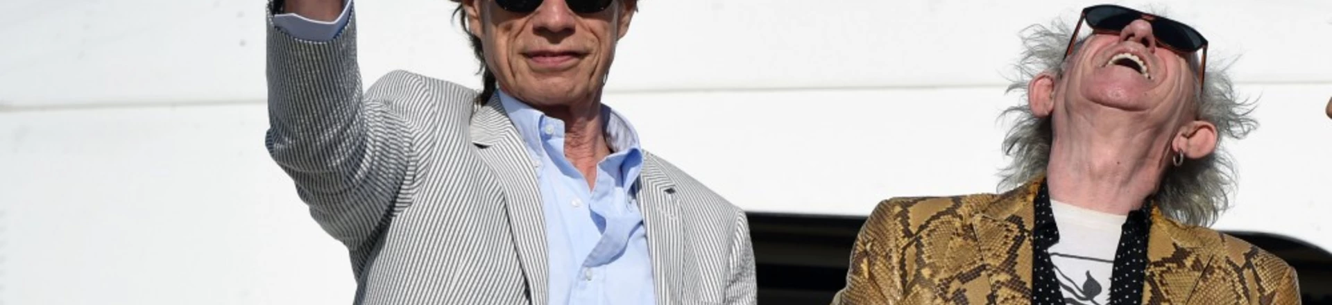 British The Rolling Stones' Mick Jagger waves next to Keith Richards upon arrival in Montevideo on February 15, 2016, on the eve of their presentation within the America Latina Ole Tour.   AFP PHOTO / PABLO PORCIUNCULA / AFP / PABLO PORCIUNCULA        (Photo credit should read PABLO PORCIUNCULA/AFP/Getty Images) British The Rolling Stones' Mick Jagger waves next to Keith Richards upon arrival in Montevideo on February 15, 2016, on the eve of their presentation within the America Latina Ole Tour.   AFP PHOTO / PABLO PORCIUNCULA / AFP / PABLO PORCIUNCULA        (Photo credit should read PABLO PORCIUNCULA/AFP/Getty Images)