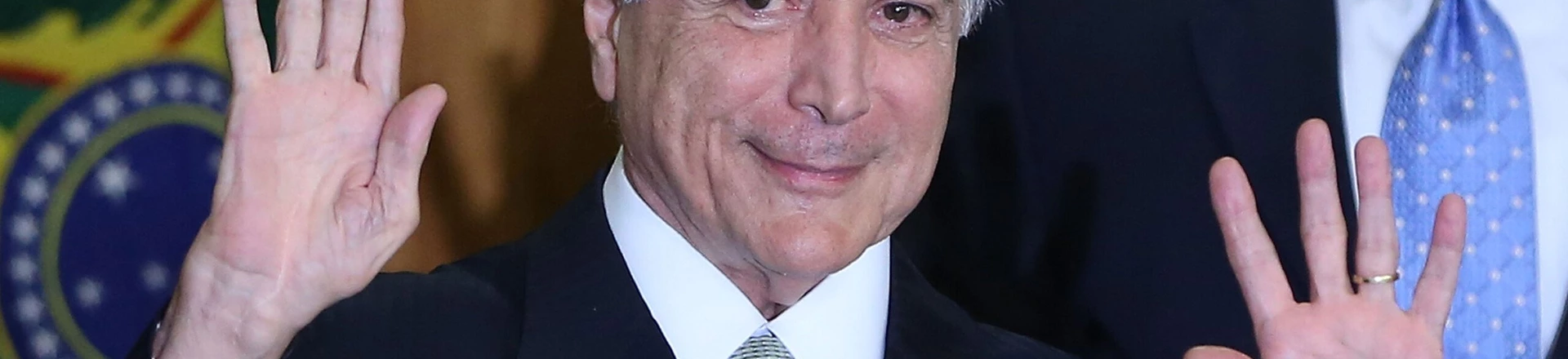 BRASILIA, BRAZIL - MAY 12:  Brazil's interim President Michel Temer waves at a signing ceremony for new government ministers at the Planalto presidential palace after the Senate voted to accept impeachment charges against suspended President Dilma Rousseff on May 12, 2016 in Brasilia, Brazil. Rousseff has been suspended from her presidential duties and will face a Senate trial for alleged manipulation of government accounts.  (Photo by Mario Tama/Getty Images) BRASILIA, BRAZIL - MAY 12:  Brazil's interim President Michel Temer waves at a signing ceremony for new government ministers at the Planalto presidential palace after the Senate voted to accept impeachment charges against suspended President Dilma Rousseff on May 12, 2016 in Brasilia, Brazil. Rousseff has been suspended from her presidential duties and will face a Senate trial for alleged manipulation of government accounts.  (Photo by Mario Tama/Getty Images)