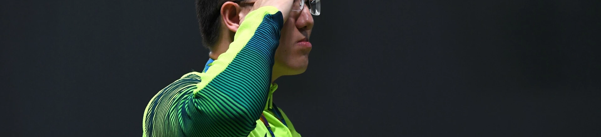 Brazil's silver medal winner Felipe Almeida Wu poses on the podium during the medal ceremony for the men's 10m air pistol shooting event at the Rio 2016 Olympic Games at the Olympic Shooting Centre in Rio de Janeiro on August 6, 2016. / AFP / Pascal GUYOT        (Photo credit should read PASCAL GUYOT/AFP/Getty Images) Brazil's silver medal winner Felipe Almeida Wu poses on the podium during the medal ceremony for the men's 10m air pistol shooting event at the Rio 2016 Olympic Games at the Olympic Shooting Centre in Rio de Janeiro on August 6, 2016. / AFP / Pascal GUYOT        (Photo credit should read PASCAL GUYOT/AFP/Getty Images)