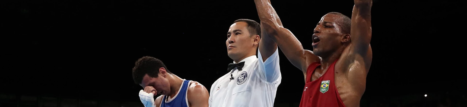 RIO DE JANEIRO, BRAZIL - AUGUST 16: Robson Conceicao (R) of Brazil celebrates after winning gold against Sofiane Oumiha of France in the Men's Light (60kg) event on Day 11 of the Rio 2016 Olympic Games at Riocentro - Pavilion 6 on August 16, 2016 in Rio de Janeiro, Brazil. (Photo by Christian Petersen/Getty Images) RIO DE JANEIRO, BRAZIL - AUGUST 16: Robson Conceicao (R) of Brazil celebrates after winning gold against Sofiane Oumiha of France in the Men's Light (60kg) event on Day 11 of the Rio 2016 Olympic Games at Riocentro - Pavilion 6 on August 16, 2016 in Rio de Janeiro, Brazil. (Photo by Christian Petersen/Getty Images)