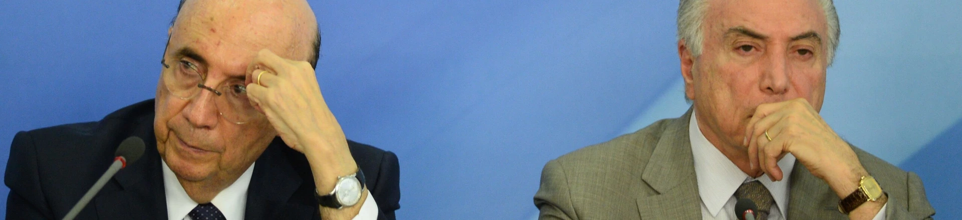 Brazilian President Michel Temer (R) and Finance Minister Henrique Meirelles (L) gesture during the announcement of new measures to stimulate the economy, in the Planalto Palace on December 15, 2016 in Brasilia. / AFP / ANDRESSA ANHOLETE (Photo credit should read ANDRESSA ANHOLETE/AFP/Getty Images) Brazilian President Michel Temer (R) and Finance Minister Henrique Meirelles (L) gesture during the announcement of new measures to stimulate the economy, in the Planalto Palace on December 15, 2016 in Brasilia. / AFP / ANDRESSA ANHOLETE (Photo credit should read ANDRESSA ANHOLETE/AFP/Getty Images)